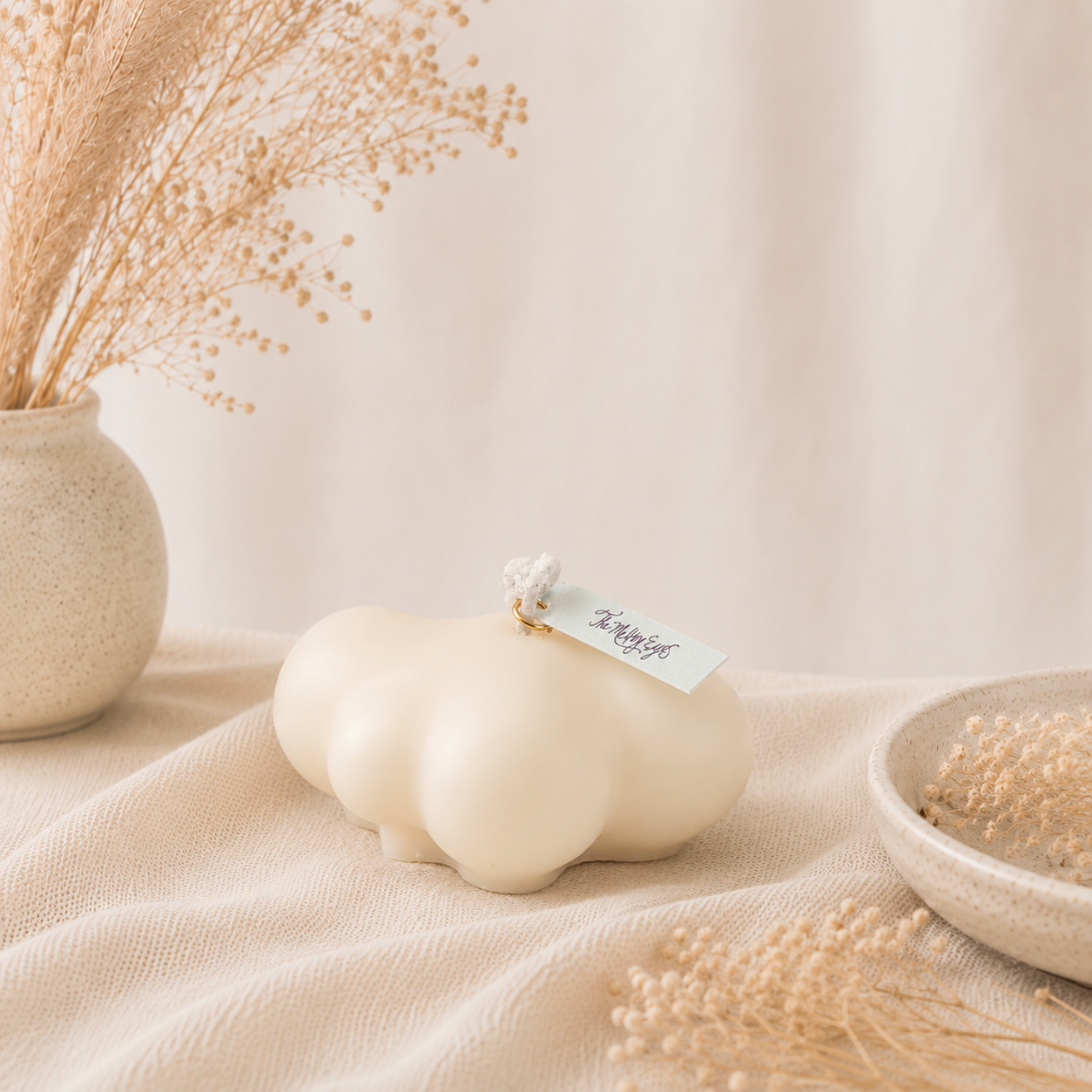 The Melting Eyes Mini Cloud decorative soy candle front view