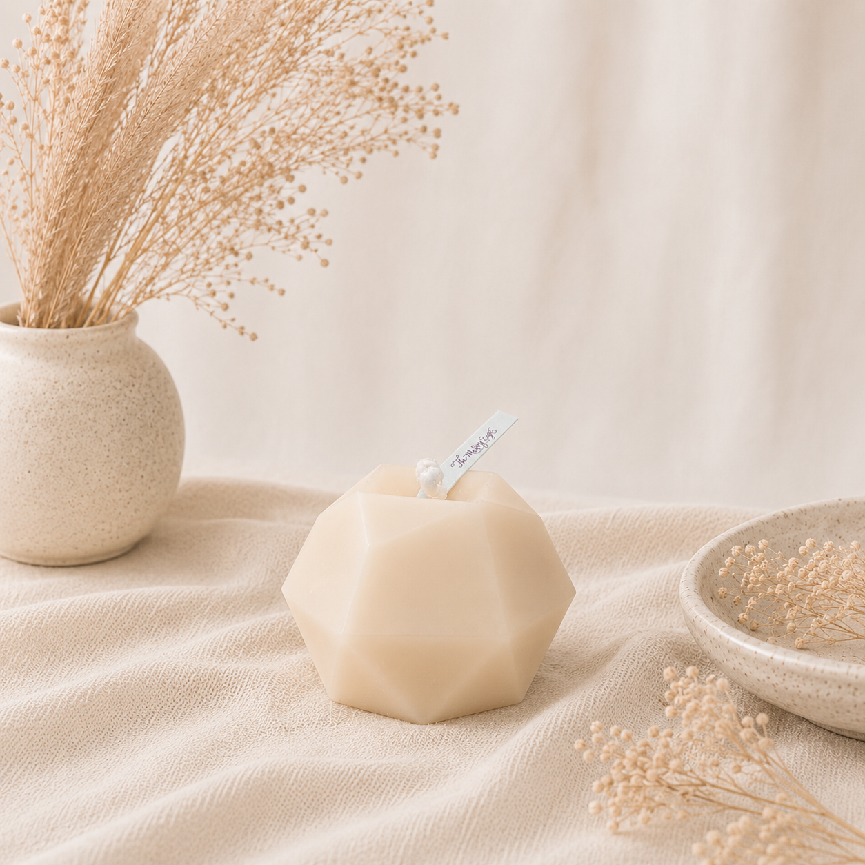 The Melting Eyes Polygon decorative soy candle front view