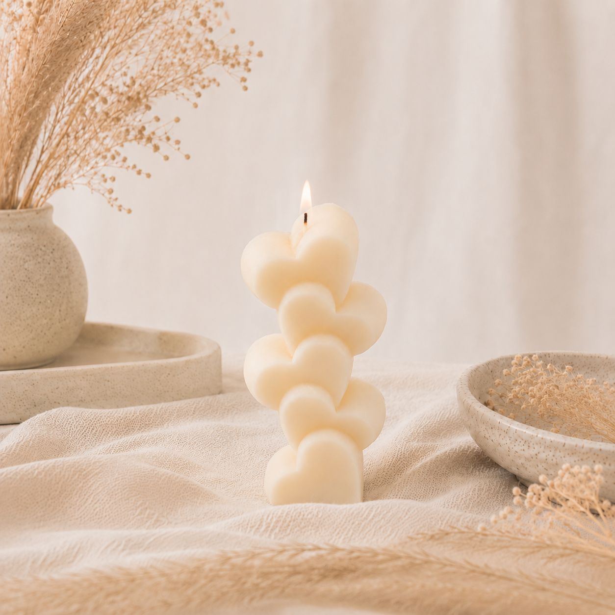 The Melting Eyes Stacked Hearts candle side view hand-poured unscented soy wax