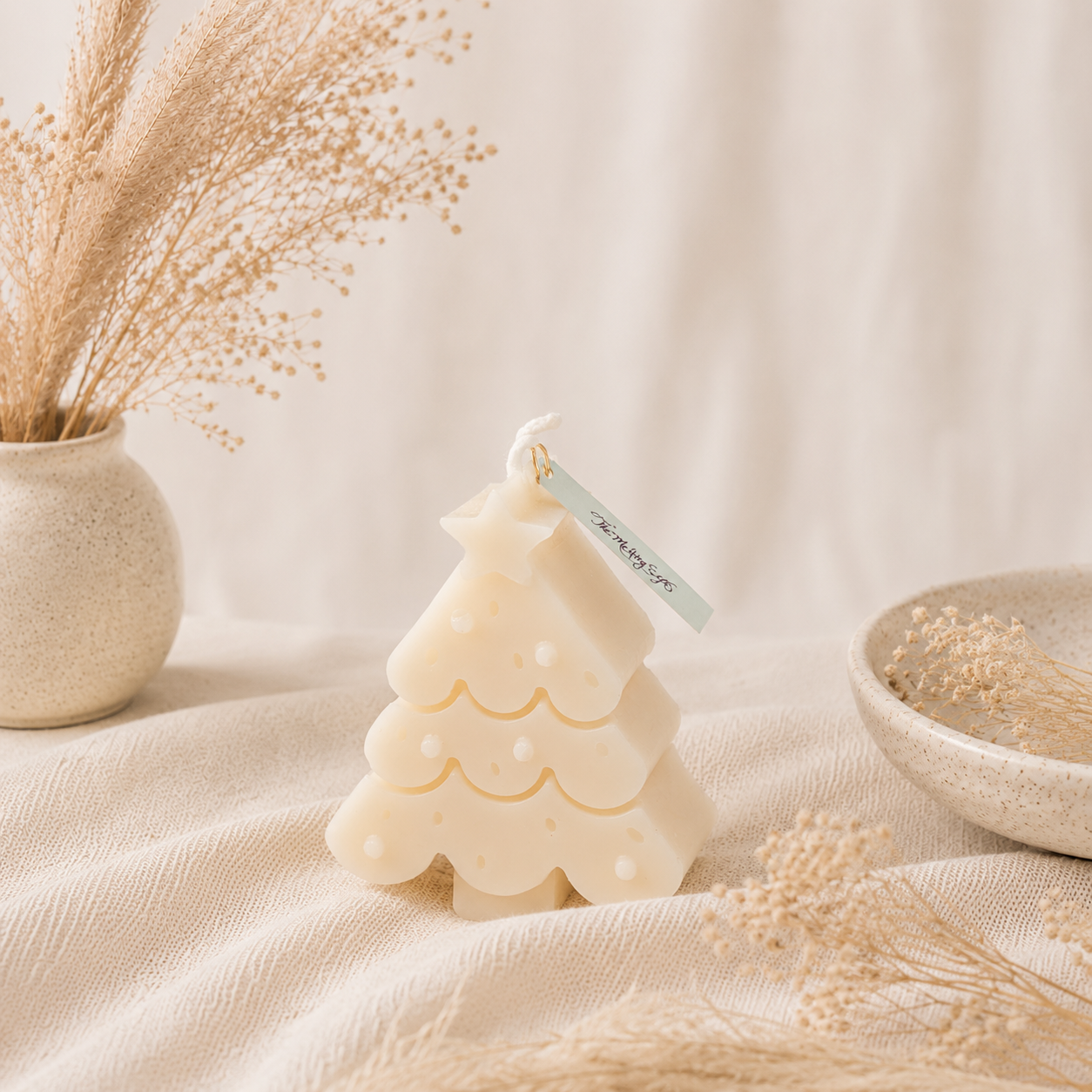 The Melting Eyes Christmas Tree decorative soy candle front view
