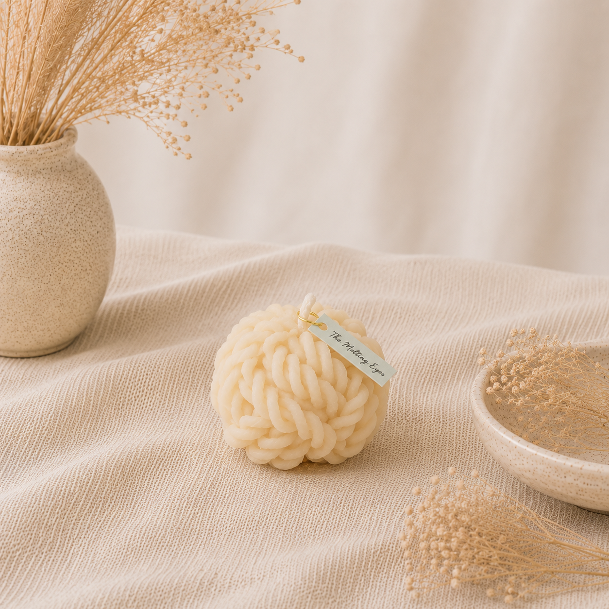 The Melting Eyes Wool Knot decorative soy candle top view